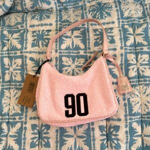 Steve Madden mini bag with the number 90 in Terry cloth light pink